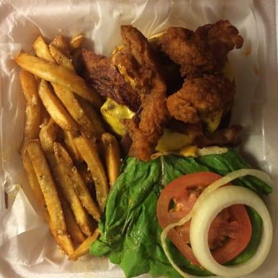 To-Go Barrel Burger with wilted lettuce, onions and soggy fries.