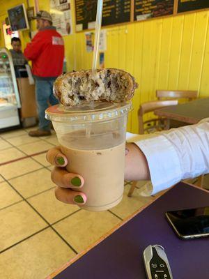 Blueberry cake donut and latte with hazelnut