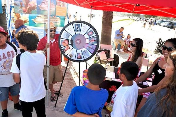 Spin the wheel at the Long Beach Tiki Festival and everyone wins a prize!