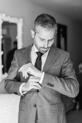 Groom getting ready on wedding day