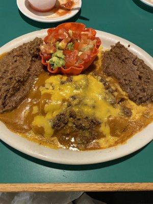 Beef enchiladas with double beans no rice. Nice little avocado salad.