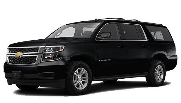 A sleek black Chevrolet Suburban, a popular full-size SUV, commonly used for luxury transportation.