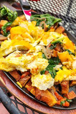 Farmers market skillet with light cheese - veggies over crispy potatoes topped with scrambled eggs and cheese