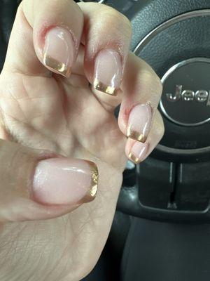 What I ended with, uneven nails and divots in nails