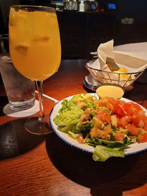 Side salad and very sweet tropical white sangria