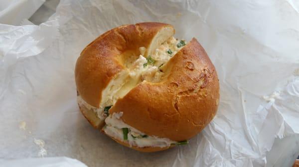 Delicious toasted bagel with lox and scallion cream cheese-served at thr bagel pub in brooklyn.