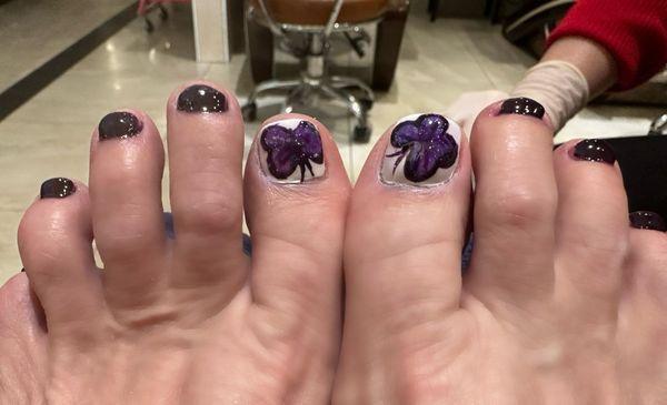 Pedicure with a butterfly