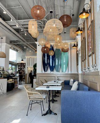 Interior of shop. Back left is entrance to open-to-outside sunny courtyard - lots of tables with umbrellas to nosh in the Miami sun!