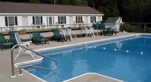 The pool invites for a cool dip, just sun bathing or relaxing with a good book.