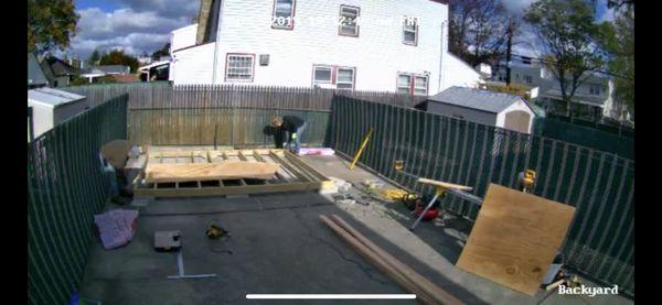 building and leveling the foundation on a concrete backyard