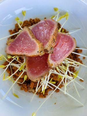 Tuna dish with garbanzo bean salad and pea shoots, delicious!