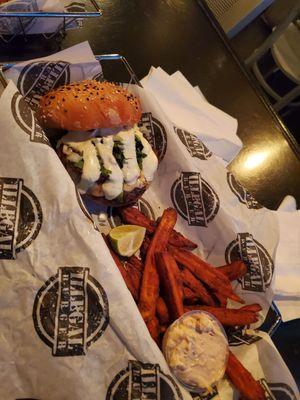 Kingpin Birria burger with delicious sweet potato fries