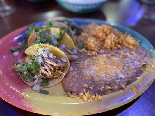 Carnitas tacos rice and refried beans