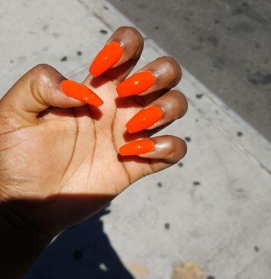 Hot orange acrylics.