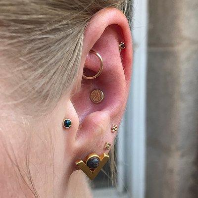 Maya Jewelry makes this great hammered, beaded piece in the Conch Piercing featured. Note all the other beautiful golds by Neometal.