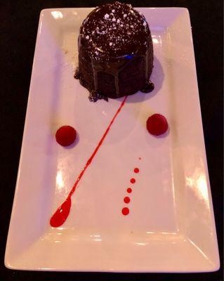 Chocolate lava cake with raspberries -- on the house for our little one, thanks to the restaurant owners' hospitality