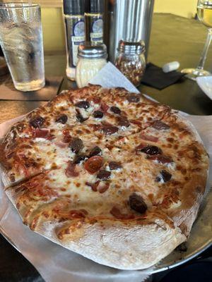 Italian meats pizza with Kalamata olives