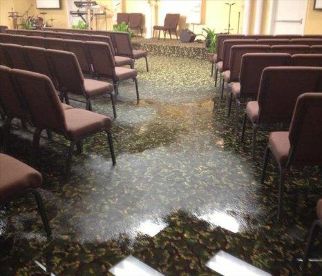 This meeting room experienced water damage after a burst pipe. The technicians at SERVPRO of Teaneck/Englewood removed all of...