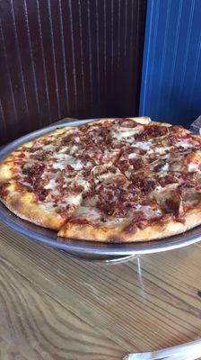 Sausage and bacon pizza