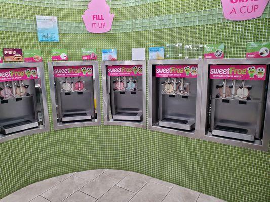 Frozen yogurt dispensers