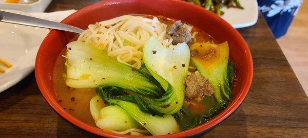 Beef noodle soup with ramen noodles (spaghetti noodle)