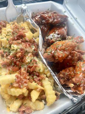 Traditional Wings Combo Meal half honey hot half buffalo with bacon and cheese fries, to die for ‍