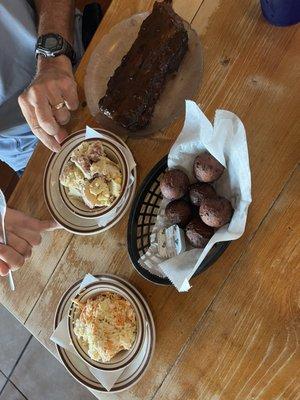 1/2 Rack Ribs with Potato Salad, Coleslaw, and Hushpuppies