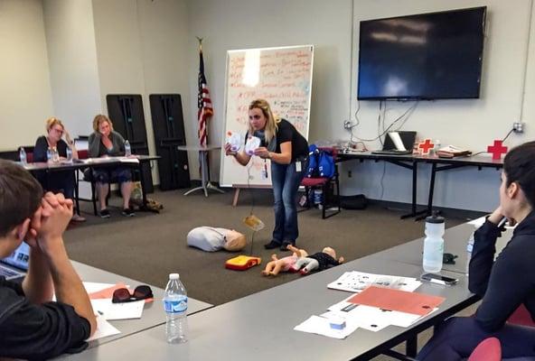 Instructor covering AED usage and information at the American Red Cross in Phoenix, AZ