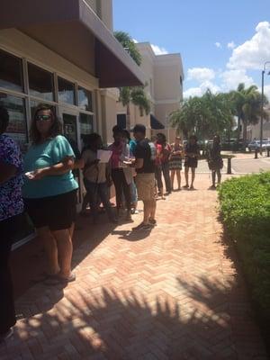 Jimmy John's employee taking orders down the block