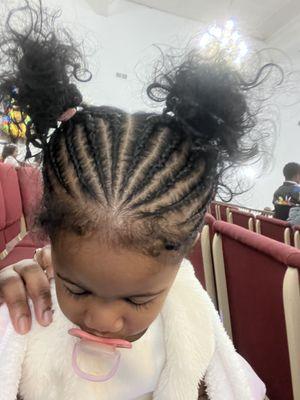 We take great pride in our work and are thrilled to have just completed a beautiful hairstyle for our one-year-old client.