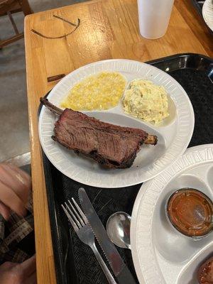 Huge Beef rib, potato salad, creamed corn