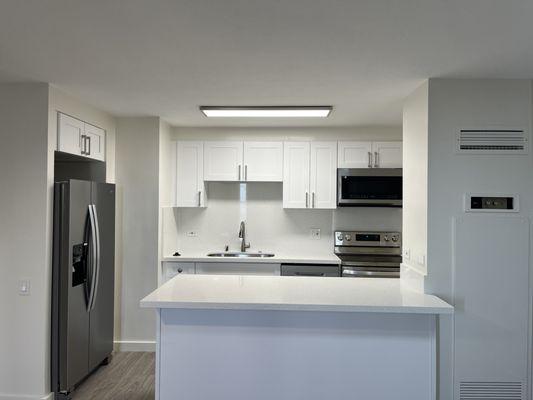 Kitchen cabinets after they did!