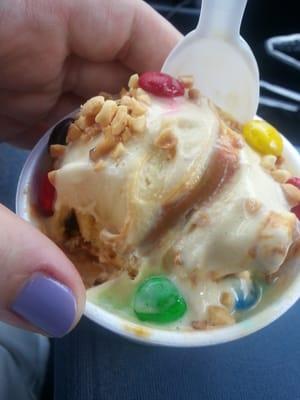 Caramel ice cream with m&ms & peanuts.