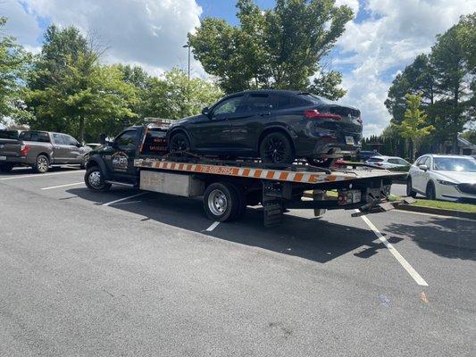 BMW picked up to go to the repair shop