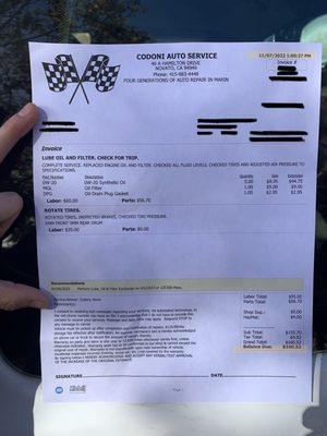 Receipt for oil change and inspection, decent prices but bad customer service..