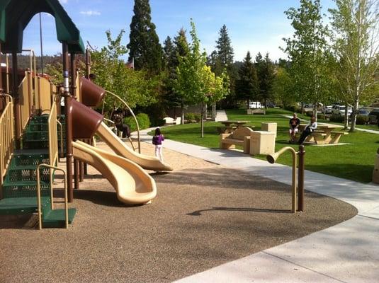 Lots of benches and a few concrete picnic tables nearby.