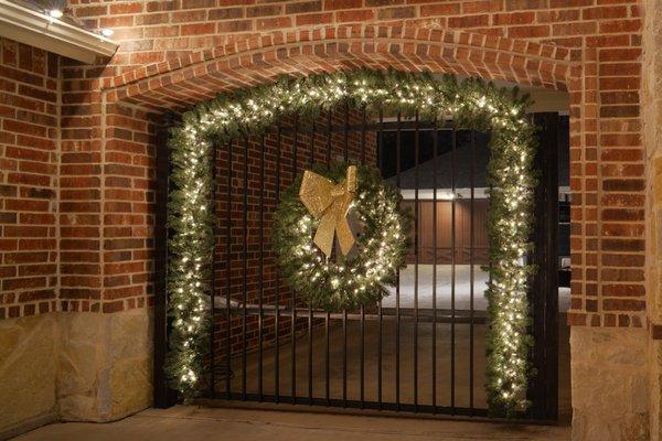 Lit garland and wreaths add to the holiday magic