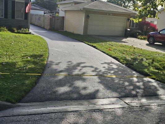 Beautiful new asphalt driveway.