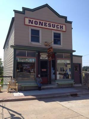 The shop at the end of US 45. Check out the quiet guy on the bench.