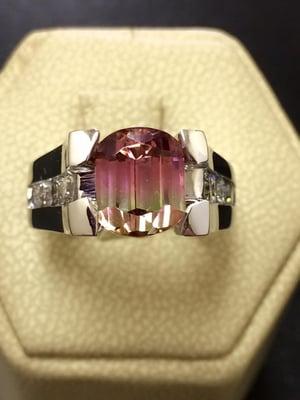 Custom design with customers own center stone.  4.8ct watermelon tourmaline set in 14kt white gold. We can help you with your own gemstones