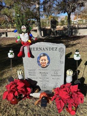 Nephew's headstone decorated for Christmas