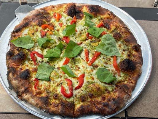 Pesto pizza with extra toppings