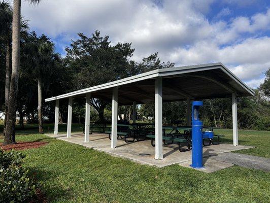 Pavilion with grills, water fountain with water bottle spout and trashes! Very clean