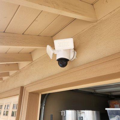 Security cam above the garage,  hardwired.