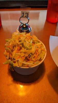 Coleslaw is made with a vinegar dressing. Much lighter and healthier!