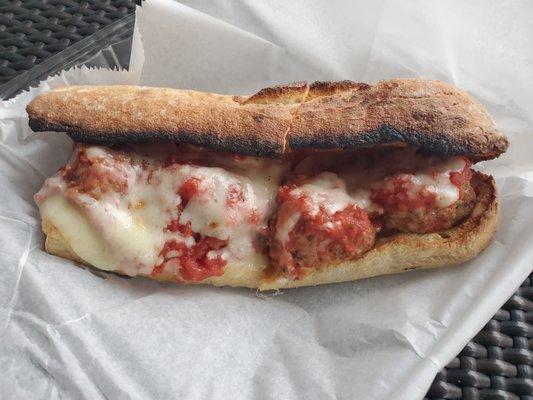 The better sandwich but slightly burnt and bland probably from frozen meatballs ($11 too)