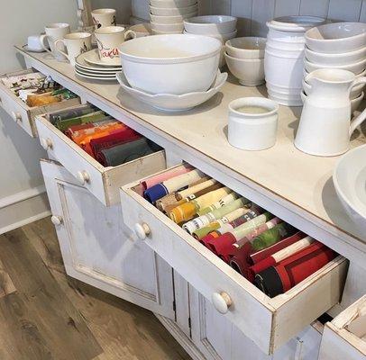 A rainbow of kitchen linens is available at Maison et Cadeaux!