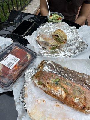 (front right) E6. Meatballs (left) Chicken parmesan (1lb) (halfway back) 1. Grilled Chicken Sandwich (back) homemade tortellini pesto