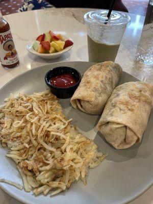 Breakfast burrito extra side of hash browns and the green smoothie