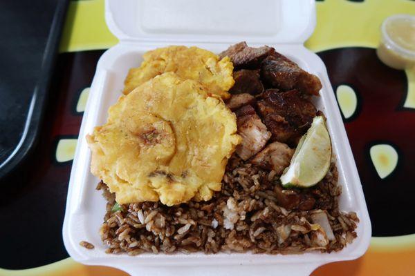 Pernil, Chofan, Tostones. (Roast pork, fried rice, fried green plantains)